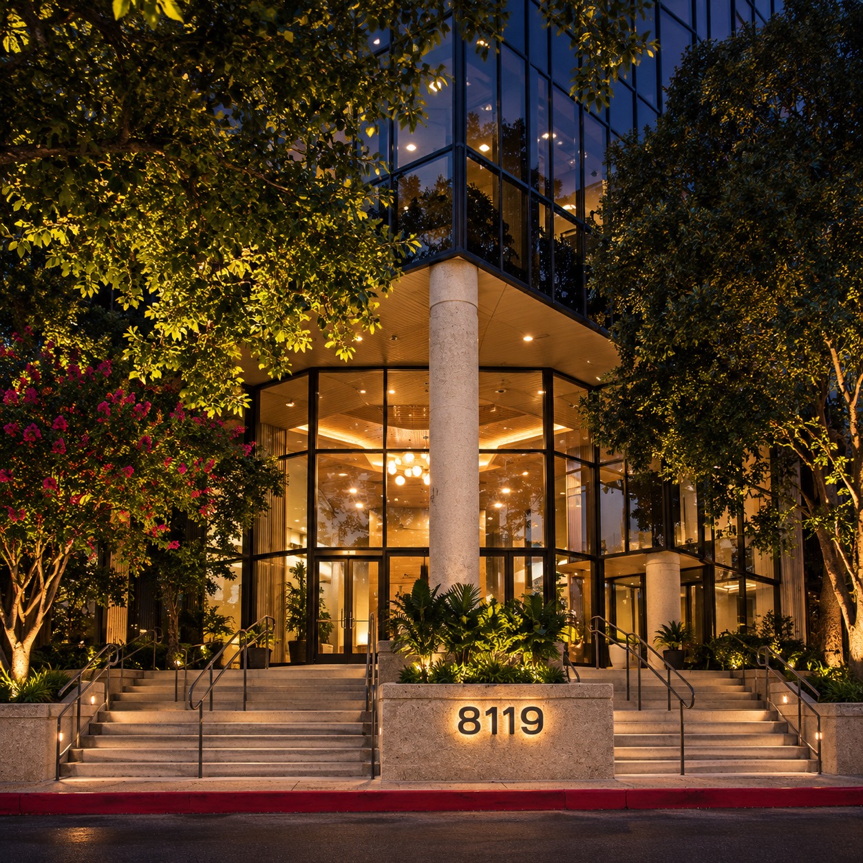 Office building entrance at night, renovated by Kreifels Construction at 8119 Datapoint