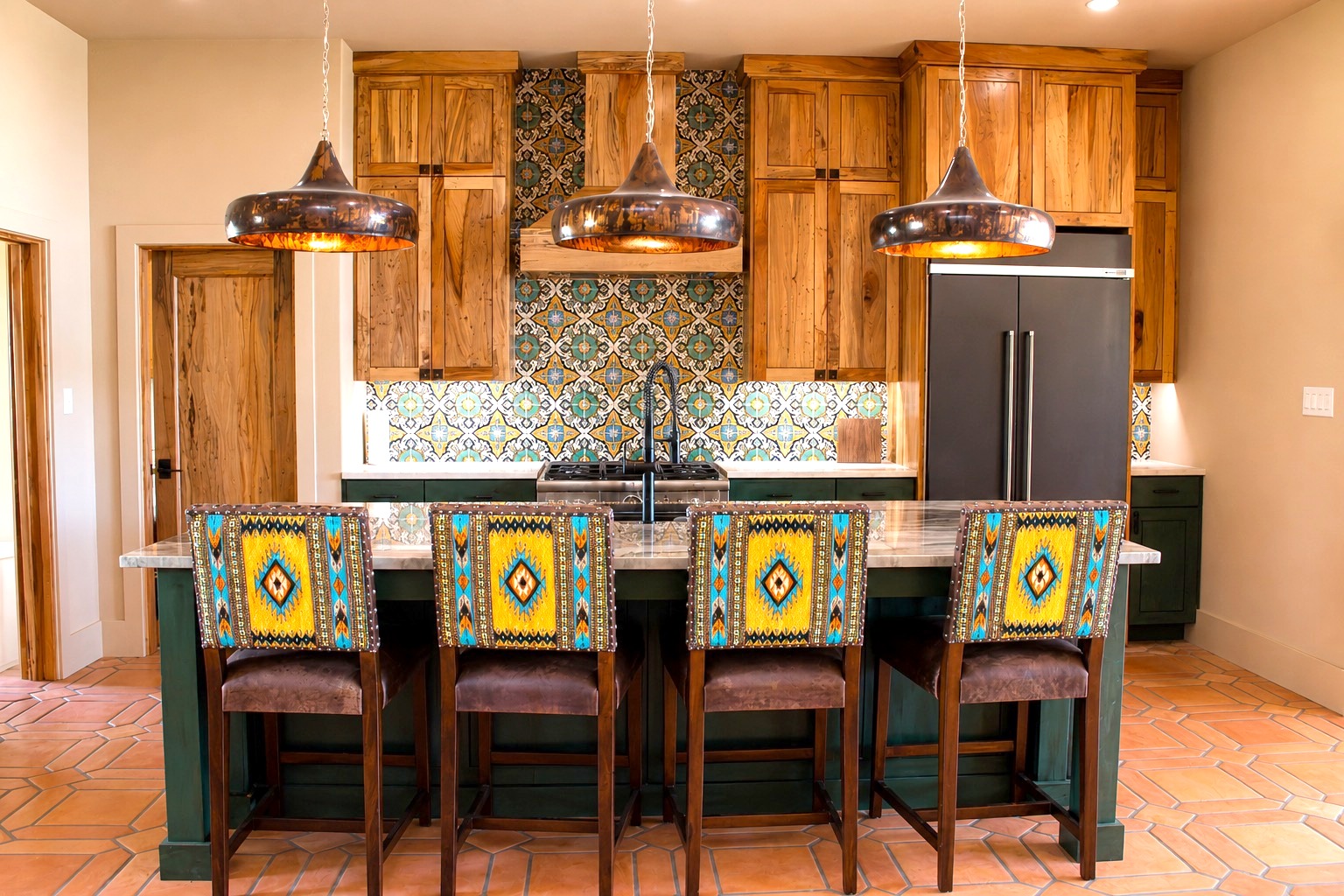 Kitchen of the Spanish-style ranch triplex built by Kreifels Construction