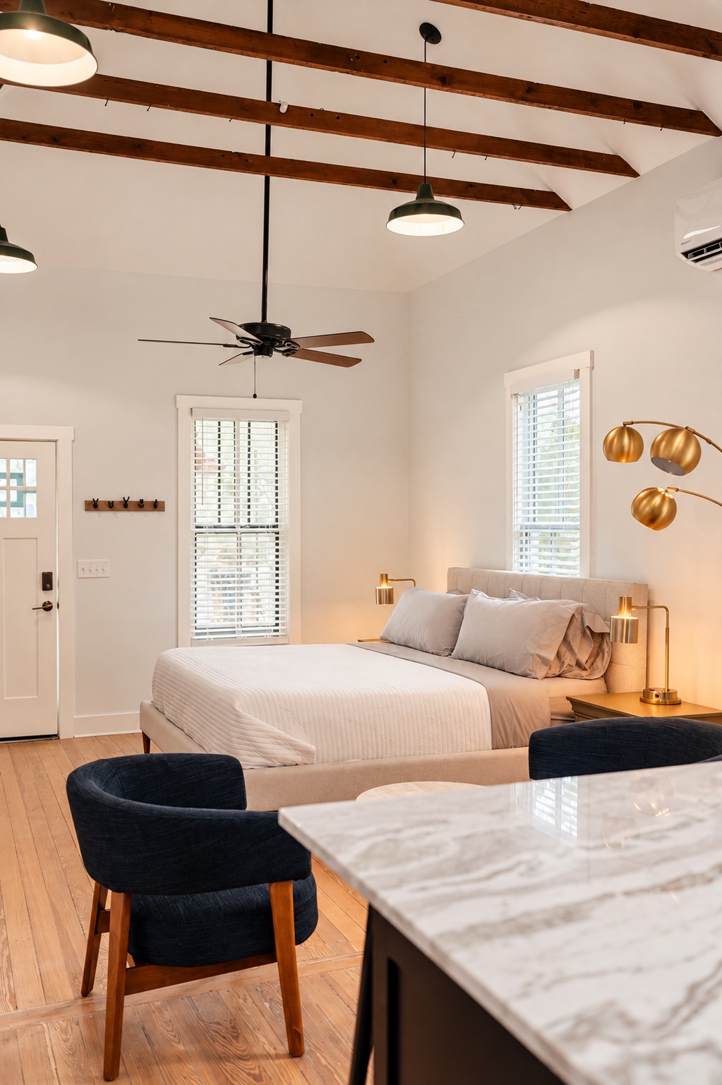 Sleeping area under exposed ceiling beams